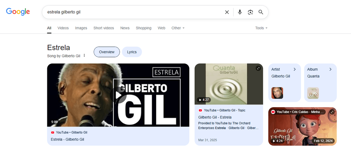 Resultado de busca no Google para a música 'Estrela' de Gilberto Gil, mostrando links para o YouTube, letras, álbum 'Quanta' e informações sobre o artista.